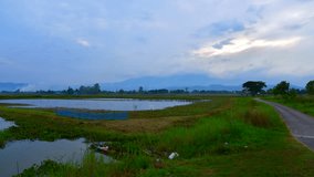4K time lapse video of Thai country with clouds flowing in Phayao province, Thailand.