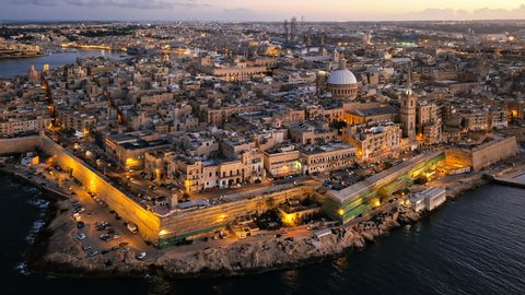 Evening aerial hyper lapse of Valletta old town, Malta