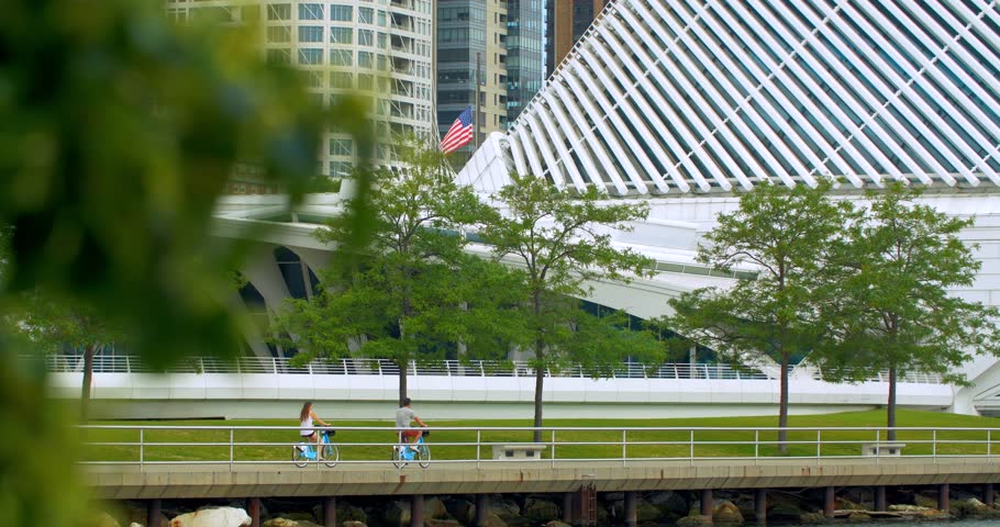 Couple Biking To to Milwaukee Art Museum