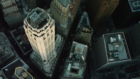 Shot on 4k RED camera on helicopter. Top down aerial view of tall buildings and city streets in New York City. 