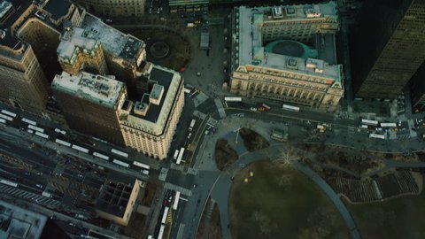 Shot on 4k RED camera on helicopter. Top down aerial view of tall buildings and city streets in New York City. 