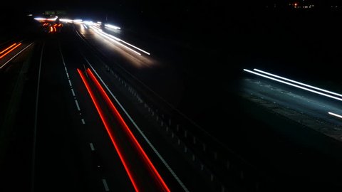 Busy time lapse traffic at night.  Seamless loop for use as a background