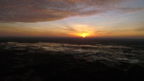 Stunning sunset colors in the plains of South America, huge savannas of water and wildlife. Aerial view of Apure, Venezuela