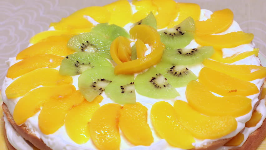 Making Peach Layer Cake. Cook at home, make a cake.