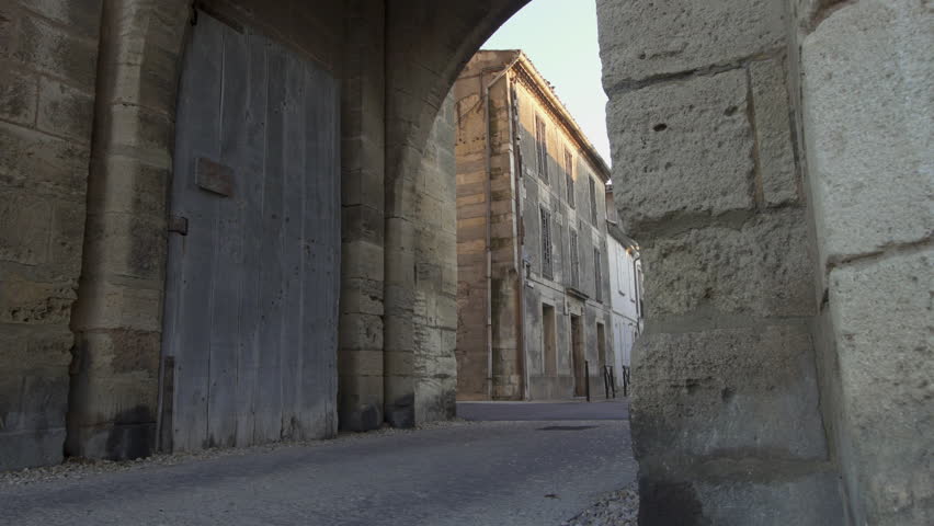 Fortress town of Aigues Mortes in southern France - panning shot (slide) of outer walls and gate