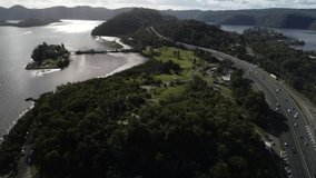 Aerial video of Pacific Highway and Hawkesbury River at Mooney Mooney, NSW, Australia 