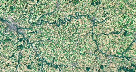 Very high-altitude overflight aerial of the Somme River, rural northern France. Clip loops and is reversible. Elements of this image furnished by NASA