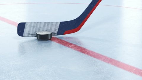 Hockey Stick Hitting Hockey Puck in Slow Motion Close-up on Ice. Beautiful 3d animation of Flying Puck. Active Sport Concept. ID Alpha Mask. 4k Ultra HD 3840x2160.