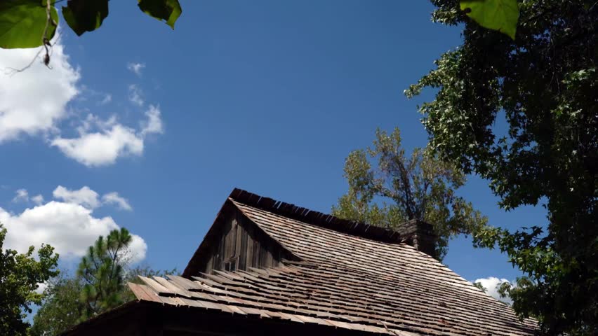 Low Angle View of Old Wooden House Roof Panning Video