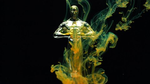Antalya / Turkey 12.11.2018 : Short video of Oscar statue and color inks in water