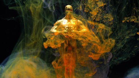 Antalya / Turkey 12.11.2018 : Short video of Oscar statue and color inks in water