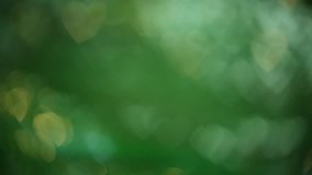 Green abstract blur bokeh background. Concept of Season Greeting Holiday