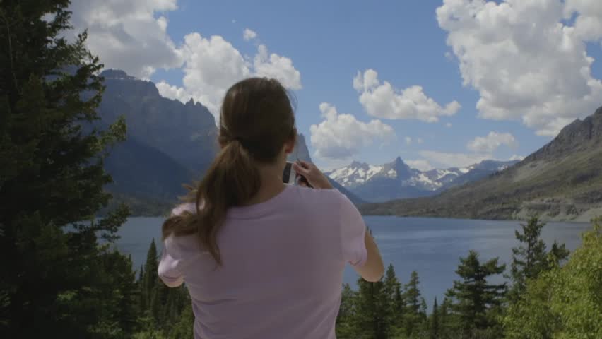 young female tourist at glacier scenic point.