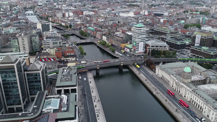 The Timelapse includes the Custom House, the new Ulster Bank building and two trains going across its tracks over the River Liffey.