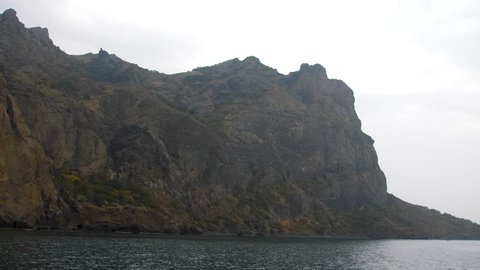 a coastal seascape with rocks
