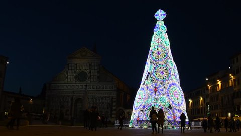 Florence, December 2018: Illuminated Christmas Tree in Piazza Santa Maria Novella, on the occasion of the F-Light Festival of Lights, during the Christmas season 2018.