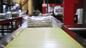 recently printed newspaper in the printing house, Packed for distribution - Powered by Shutterstock - Get 15% off with code: PIKWIZARD15