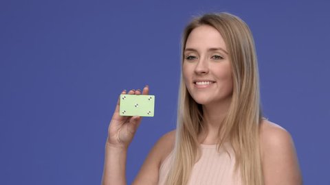 Young and beautiful woman presenting your buisness card
