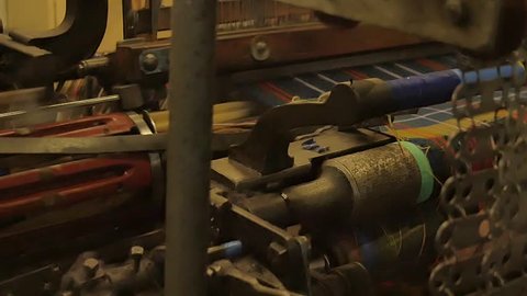 Scottish Tartan fabric production - waiving mill - Scotland - Slow motion footage
