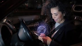 Girl touches holographic navigation touch screen of mobile phone while sitting behind steering wheel of car and smiles. Beautiful woman with globe hologram at smartphone in the vehicle - Powered by Shutterstock - Get 15% off with code: PIKWIZARD15