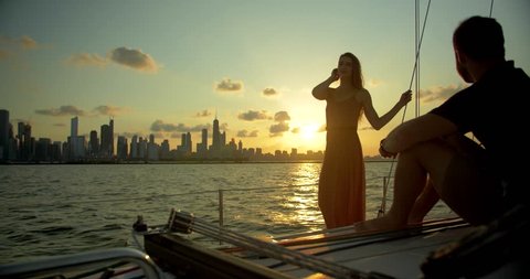 Couple on Sailboat at Sunset, Chicago Skyline