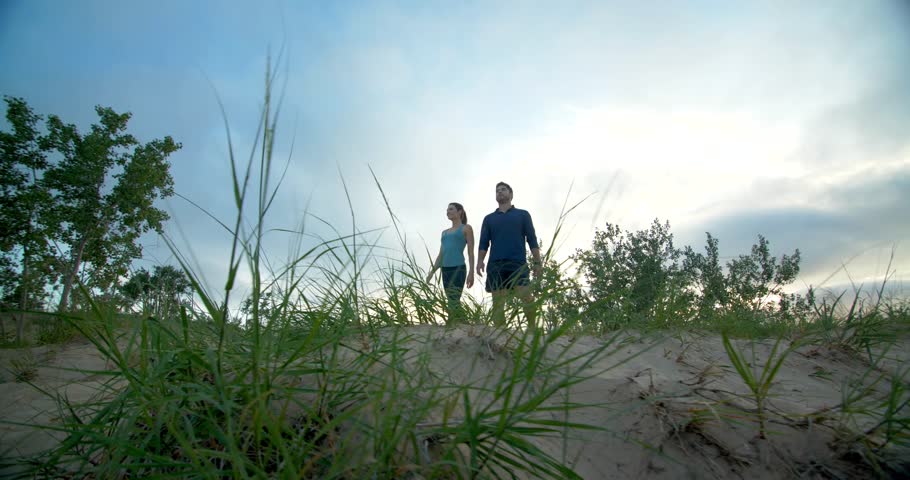 Couple Reaches the Top of Sleeping Bear Dunes, Michigan