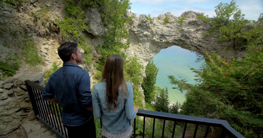 Couple At Rocky Cliffs, Beach
