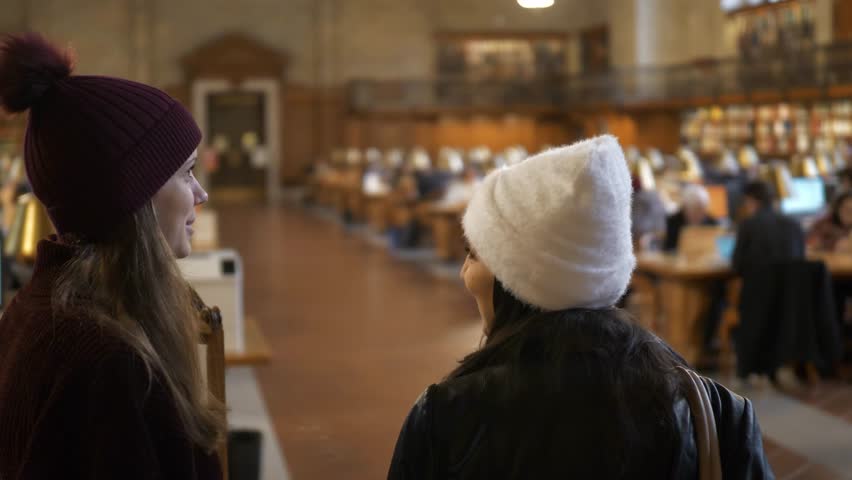 Young woman visits a public library