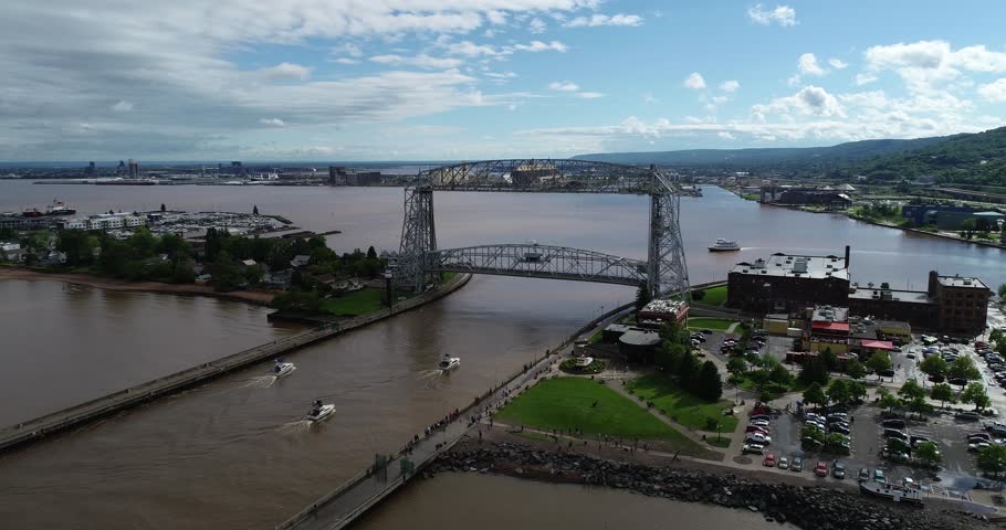Boats Passing Under Lifting Bridge in Duluth, Minnesota - Aerial