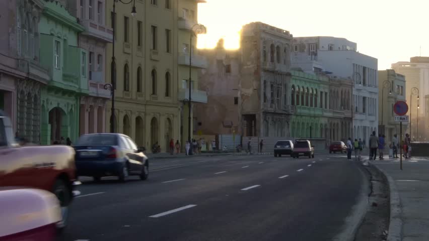 Colorful Classic 1950's American Vintage Cuban Convertible Taxi Cars driving on malecon street old Havana, Cuba. Cuba travel. Royalty-Free Stock Footage #1021009684