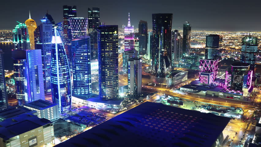 QATAR, DOHA, MARCH 20, 2018: Night rooftop cityscape panorama timelapse of financial district in Doha - capital and most populous city in Qatar, West Bay, Persian Gulf, Arabian Peninsula, Middle East | Shutterstock HD Video #1021034347