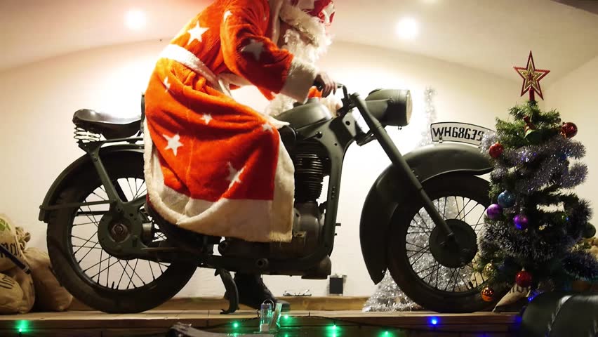Santa on a motorcycle | Shutterstock HD Video #1021040275