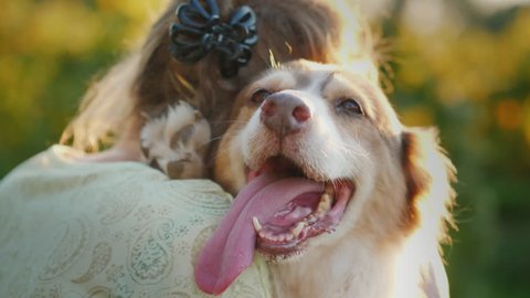 Owner hugs his beloved dog