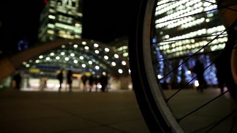 Bike in Canary Wharf at night, slider shot 