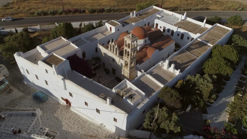 Aerial view of Agios Nikolaos church in Spetses next to a road, Greece.
