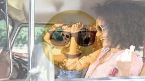 Animated Yellow Emoticon with sunglasses against woman enjoying car ride background - Powered by Shutterstock - Get 15% off with code: PIKWIZARD15