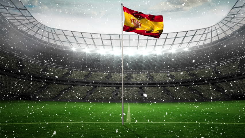 Spanish Flag in soccer field against snow background on football stadium