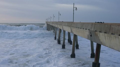 Pier with waves in California
