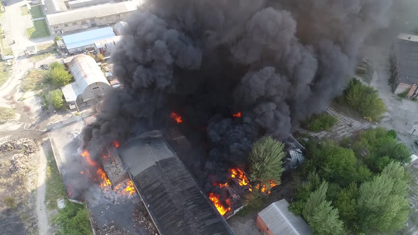 Big fire and black smoke shooting from a height 6 | Shutterstock HD Video #1021147465
