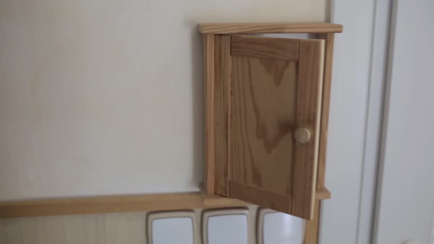 Wooden Shelf on the Wall for the Keys
