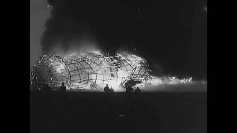 CIRCA 1937 - The Hindenburg is engulfed in flames as it comes in for its Lakehurst landing.