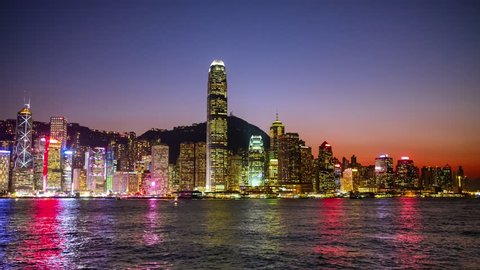 Hong Kong Island Skyline and Victoria Harbor at Night View - time lapse