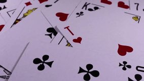 Playing cards. Poker card rotating pattern macro texture background backdrop footage video.