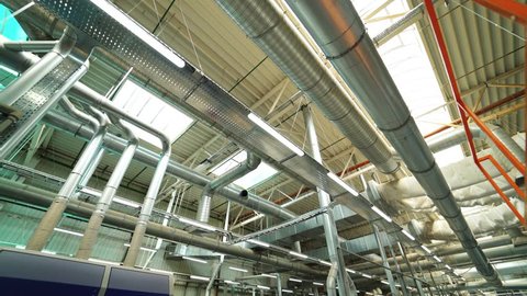 View of the ventilation system of the parquet factory. Camera motion to forward