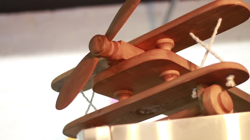 Close - up wooden plane in cafe