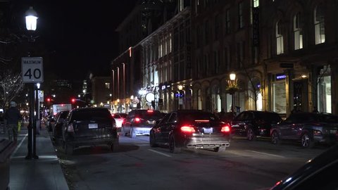 Toronto, Ontario, Canada December 2018 Busy Toronto streets at night during rush hour with people and transit