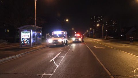 Toronto, Ontario, Canada December 2018 Car accident at night on dark city street 