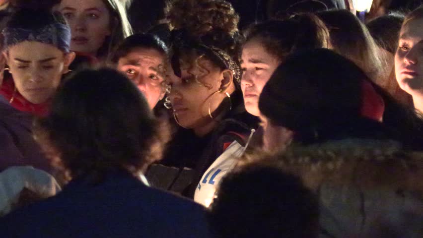 Toronto, Ontario, Canada December 2018 Candlelight vigil for teen high school student murdered in Mississauga Canada | Shutterstock HD Video #1021220113
