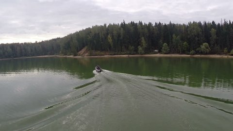 Aerial View Boat on Forest Lake