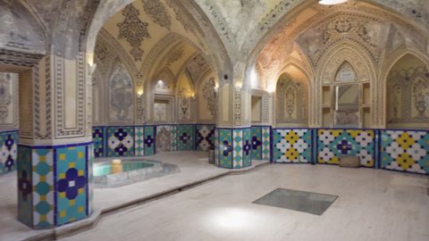 Kashan, Iran - 21 October, 2018: Panning motion of hot bathing hall (garmkhaneh) at Sultan Amir Ahmad Bathhouse. Traditional Iranian public bathhouse. Beautiful Persian interior.